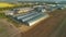 Arched hangars, a large storage for agricultural products. View from above.