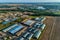 Arched hangars, a large storage for agricultural products. View from above