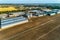 Arched hangars, a large storage for agricultural products. View from above