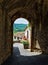 An arched passageway in old Italian city