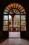 Arched spanish door at mexican anbandoned medieval hacienda