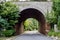 Arched tunnel made of bricks in a forest in Jechun, South Korea