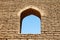 Arched Window in Brick Wall