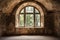 Arched window in a crumbling brick room, overlooking serene trees