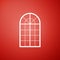 Arched window icon isolated on red background