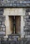 Archer`s loop-hole in a Windsor Castle wall