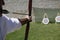 Archer shooting a long bow