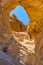 The Arches, amazing round hole in the rock, closed arch in ancient cooper mines canyons and mountains range in Timna National Park