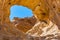 The Arches, amazing round hole in the rock, closed arch in ancient cooper mines canyons and mountains range in Timna National Park