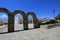 Arches behind main square, mountain village Cachi, Argentina