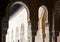 Arches of Court of the Lions at Alhambra. Granada, Spain