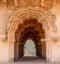 Arches of lotus temple in the ancient ruins of Hampi