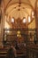 Arches,pillars and altarpiece of the cathedral of Murcia