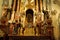 Arches,pillars and altarpiece of the San Juan de Dios church