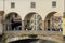 Arches of the Ponte Vecchio bridge over Arno river in Florence, Italy.