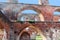 Arches of red brick in a ruin of a monastery building, Northern