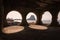 Arches of the ruins of the Manzanera in Calpe, with the Ifach crag in the background, Spain