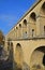 Arches of Saint Clement roman aqueduct to bassin principal du Peyrou, water tower at Promenade du Peyrou in Montpellier, France