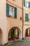 Arches under bending medieval houses, Varese Ligure, Italy