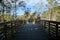 Arching Wooden Pedestrian Bridge in Rural Setting