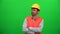 Architect or construction worker looking up on green screen. Right Side.