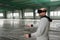 Architect with VR visor exploring industrial building environment