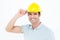 Architect wearing hardhat over white background