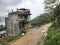 Architectural building in a hill of Clouds and Trees