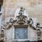 Architectural decorations on the wall of the house at Saint James Street in Bordeaux. France.