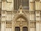 Architectural detail of Brussels Cathedral with arch and statues of saints