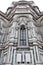 Architectural detail of polychrome marble facade exterior of Florence Cathedral architecture