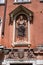 Architectural detail, a stone bas-relief of the Virgin Mary and little Jesus on the wall of a house in Venice. Picture