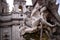 architectural detail Zeus statue of fountain in Piazza Navona Rome. Italy