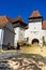 Architectural details of medieval church. View of fortified church of Viscri, UNESCO heritage site in Transylvania. Romania, 2021