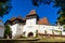 Architectural details of medieval church. View of fortified church of Viscri, UNESCO heritage site in Transylvania. Romania, 2021