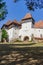 Architectural details of medieval church. View of fortified church of Viscri, UNESCO heritage site in Transylvania. Romania, 2021