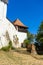 Architectural details of medieval church. View of fortified church of Viscri, UNESCO heritage site in Transylvania. Romania, 2021