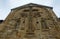 Architectural details on wall of the Gergeti Trinity Church. Tsminda Sameba.