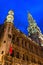 Architectural ensemble of Grand Place, City Hall in evening illumination, Brussels, Belgium