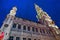 Architectural ensemble of Grand Place, City Hall in evening illumination, Brussels, Belgium