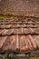 Architectural grunge aged roof clay tiles