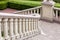 An architectural staircase of granite and stone with railings.