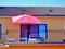 Architecture, apartment with balcony garden furniture and parasol, exterior,