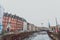 Architecture and buildings of the streets of Copenhagen featuring frozen canals with ice blocks in the water