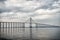 Architecture and design concept. Bridge over sea in manaus, brazil. Road passage over water on cloudy sky. Travel destination and