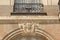 Architecture detail with sculpted face of the Opera of Rennes