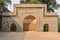 A architecture at humayun tomb memorial from the side of the lawn at winter foggy morning