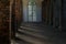 Architecture of old brick hallway in red color