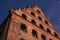 Architecture of old Gdansk Renaissance style red brick house in the center of the town