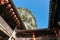 Architecture of old house with tiled roofs with mountain on background in Pho Co street, Dong